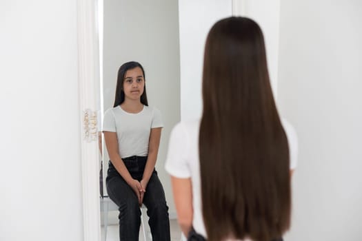 teenage girl with long hair haircut