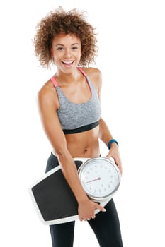 Discipline is necessary to achieve any goal worth having. Studio portrait of a fit young woman holding a scale against a white background.