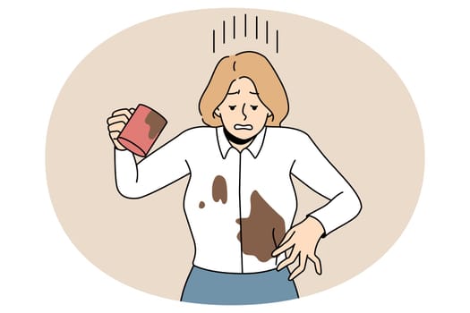Distressed businesswoman spill coffee on blouse