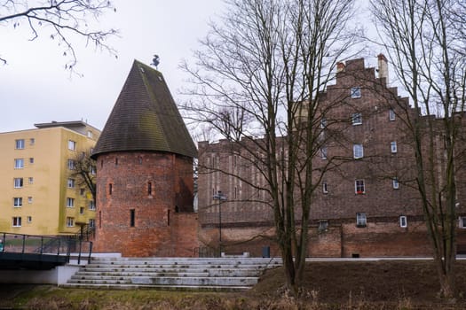 Round tower in the historic surrounding city wall of Slupsk, Poland. Witches tower - Baszta Czarownic in Slupsk. Sights of Poland. Old jail. Travel destination. Tourist attraction