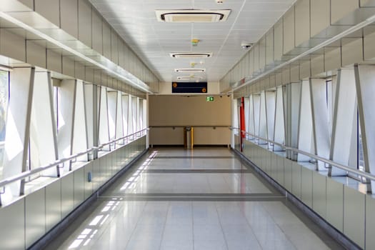The empty corridor hallway to the train station in Dubai