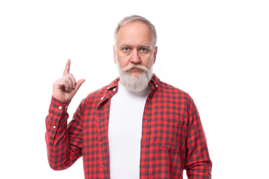 smart 60s retired man with white beard and mustache