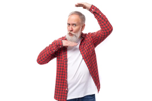handsome 60s middle aged mature man in stylish shirt makes a face