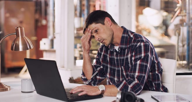 Headache, tired and a man with a laptop and stress from an email, project or communication. Frustrated, anxiety and a businessman reading a chat on a computer about a mistake or work fail in office