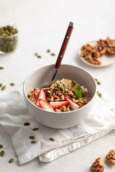 Oatmeal porridge with strawberries and banana