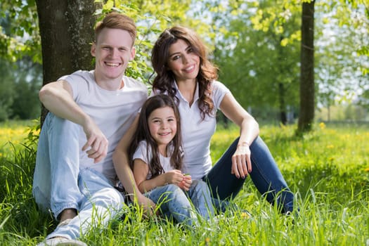 Portrait of happy family in park
