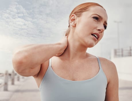 Outdoor, neck pain and woman training, workout and muscle tension from exercise, fitness and strain. Female, athlete and lady outside, accident and medical care for injury, inflammation and bruise