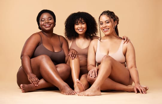 Body, skin and portrait of diversity women group together for inclusion, beauty and power. Aesthetic model friends on beige background for skincare glow, pride and motivation for underwear self love
