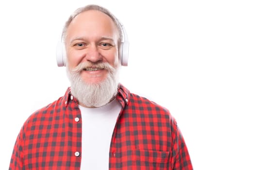 music lover 60c retired man with white beard and mustache with headphones