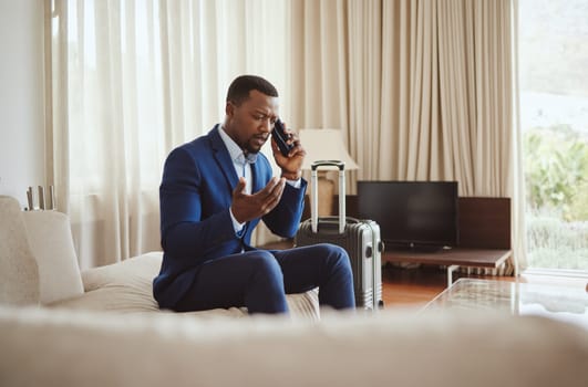 Phone call, travel stress and businessman with a phone for hotel communication, transport problem and work fail. Angry, conversation and black man with a mobile talking about accommodation mistake