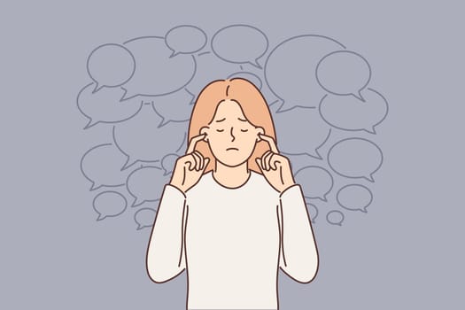 Frustrated woman does not want to hear opinions of others and closes ears from propaganda