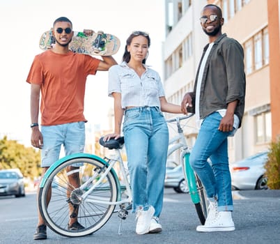 Fashion, Gen Z and skater friends portrait in road for hangout in Los Angeles neighbourhood. Skateboard, bike and diverse friendship with trendy people gathering for street leisure together.