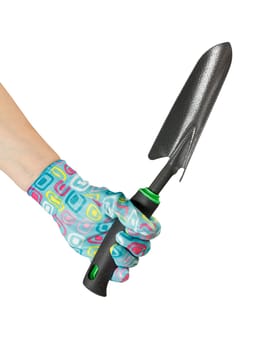 Small garden trowel in a hand dressed in a glove on the white isolated background