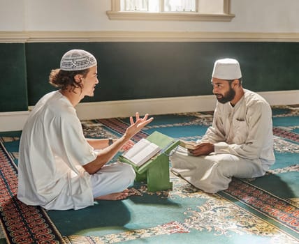 Muslim pray, worship or men studying the Quran for peace, mindfulness or support from Allah in holy mosque. Learning, Islamic or people talking, reading or praying to worship God on Ramadan Kareem