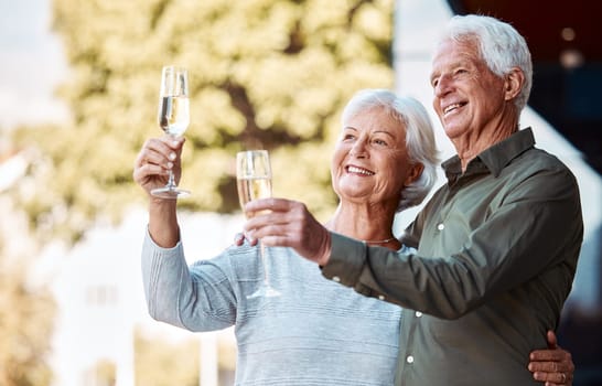 Senior couple, champagne toast and hug with love, relationship happiness and care in home backyard. Elderly man, woman and glass for celebration, romance or marriage anniversary with smile in summer.