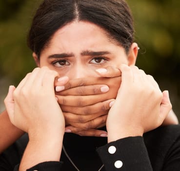 Woman, portrait and victim silence with hands on face for domestic violence protest campaign. Sad, fear and scared girl vulnerable with secret of sexual abuse, aggression and harassment.