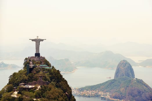 Landscape, monument and aerial of Christ the Redeemer for tourism, sightseeing and travel destination. Traveling, Rio de Janeiro and drone view of statue, sculpture and Brazil landmark on mountain