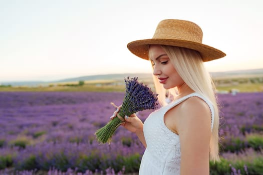 Blond haired girl standing in lavender field