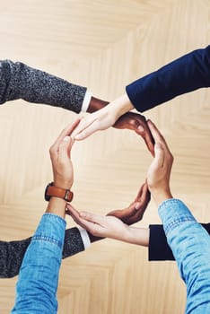 Above, recycling or hands of business people in circle for motivation, support or sustainability in office. Teamwork, recycle or employees for sustainable goals, community help or partnership group