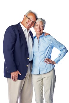 Love, smile and portrait of senior couple hugging in studio, isolated on white background. Retirement, happy and healthy relationship, romance for elderly man with woman together in formal clothes