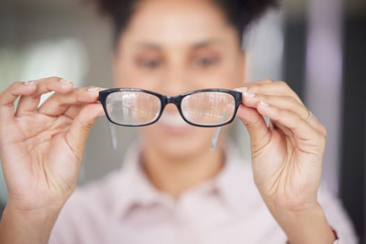 Glasses, vision and hands with a black woman customer in an eyewear store for prescription lenses. Fashion, retail and spectacles with a female consumer buying a frame for eyesight at an optometrist