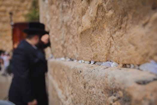 Religious orthodox jew praying at the Western Wall in the old city of Jerusalem Israel