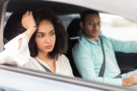 Displeased Middle Eastern Wife Expressing Unhappiness Towards Husband In Car
