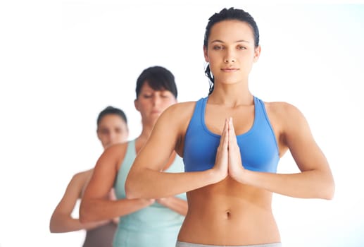 Peace, meditation and young women with zen and yoga exercise outdoor with a pilates instructor. Spiritual, namaste and wellness of training, workout and healthy fitness feeling calm from meditating