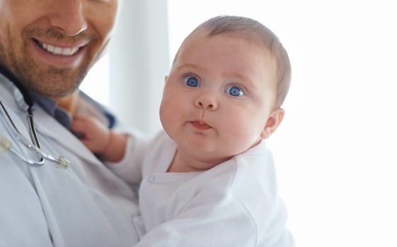 Funny, face and baby with pediatrician in hospital for medical support and growth in portrait. Cute newborn kid, pediatrics doctor and healthcare service, expert consulting and clinic for children