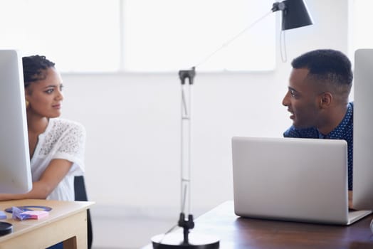 Computer, people or black man talking to woman in startup or research project in digital agency. Collaboration, laptop or worker helping, training or speaking of online communication to employee