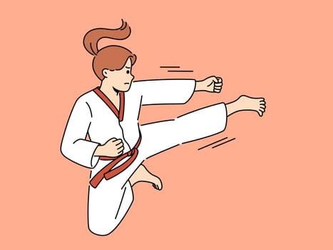Woman in kimono practice karate