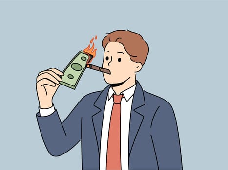 Rich businessman burn dollar bill with cigar