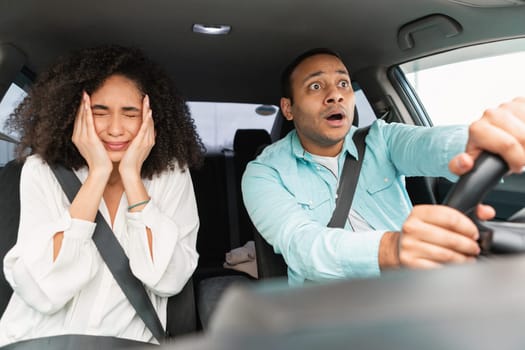 Stressed Middle Eastern Couple Having Risk Of Accident Driving Car