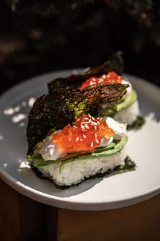 Japanese hand rolls with caviar and avocado
