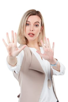 Hold on. Stop business woman and wait sign or hand gesture looking serious and isolated against a studio white background. Portrait of warning, no or corporate employee assertive rejection with palm.
