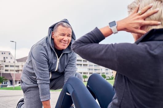 Fitness, workout and sit ups with a senior couple training outdoor together for an active lifestyle of wellness. Health, exercise or core with a mature man and woman outside on the promenade.