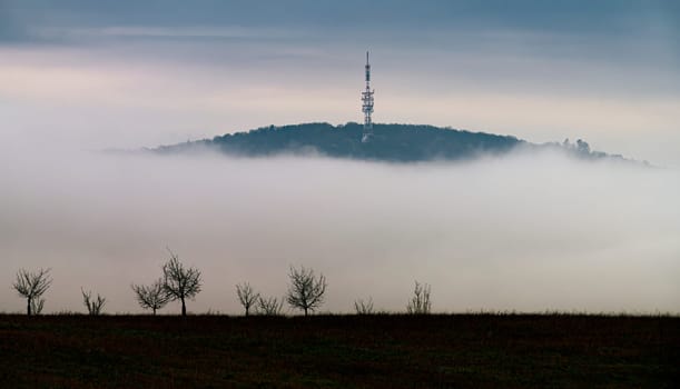 Morning mist at Moravia with visible hill, Czech Republic