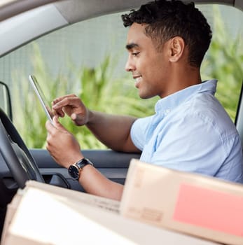 Courier, driver in car with tablet, smile and boxes, checking location, order or online map for logistics. Service, happy delivery man in van with package or box, online for digital logistic schedule.