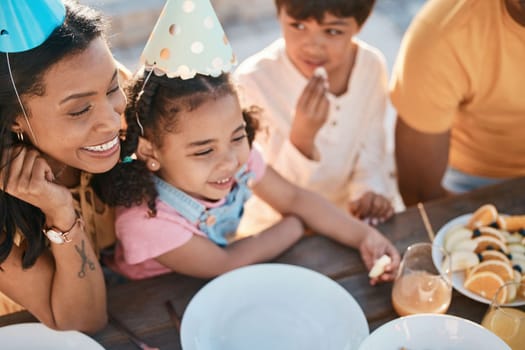Birthday, mother and children with food in park for event, celebration and party outdoors together. Family, fun social gathering and happy mother with kids at picnic with cake, presents and snacks