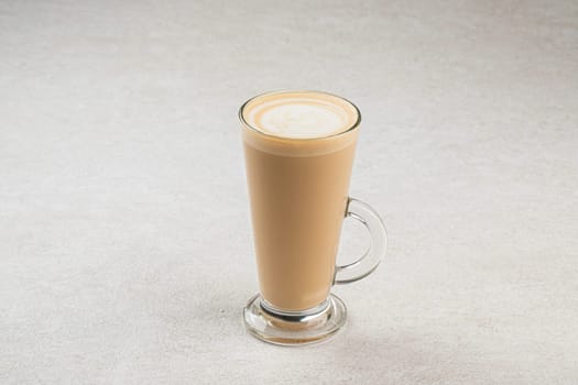 Glass mug of latte coffee macchiato