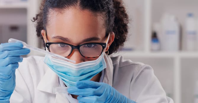 Woman scientist, petri dish test and face mask with focus on futuristic research and virus data. Science, African female person and young employee working in a laboratory with chemistry analysis