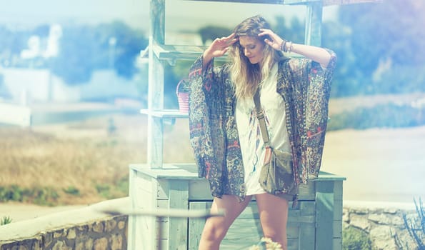Wild at heart. a bohemian young woman spending a summer day outside.