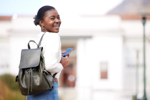 Black woman, phone and portrait of student at college, university or person ready for learning, goals or education. Girl, face and happy learner studying on campus or walking outdoor with backpack