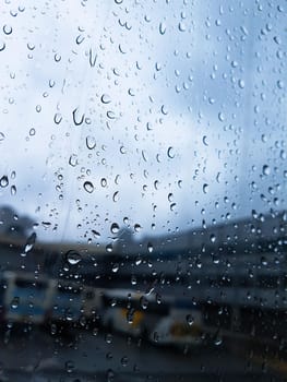 sky,drop,window,rain,drizzle,water,precipitation,cloud,moisture,windshield
