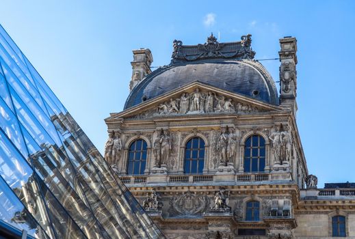 Paris / France - April 03 2019. The Louvre Museum and its reflection