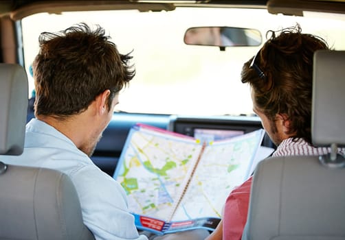 Road trip, map and people for travel adventure, journey and holiday with tourism guide, check and planning. Driver, men or young friends with location search, direction and destination from behind