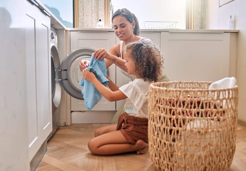 Happy, laundry and washing machine with mother and daughter for helping, learning and cleaner. Housekeeping, teamwork and basket with woman and young girl in family home for teaching and cleaning