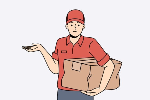 Distressed deliveryman with damaged parcel