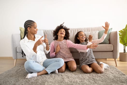 Funny Black Mom And Daughters Posing Having Fun At Home