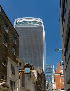 St Mary at Hill Street in the City of London with skyscrapers